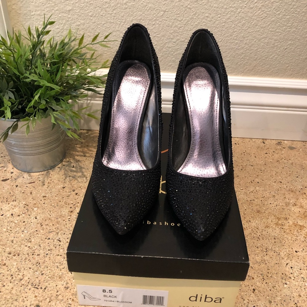 Done black rhinestone pumps